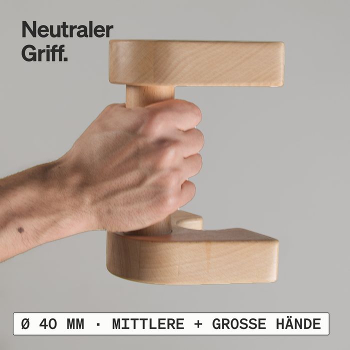 Eine Hand umfasst den Griff eines LG1-Kompakt-Paares