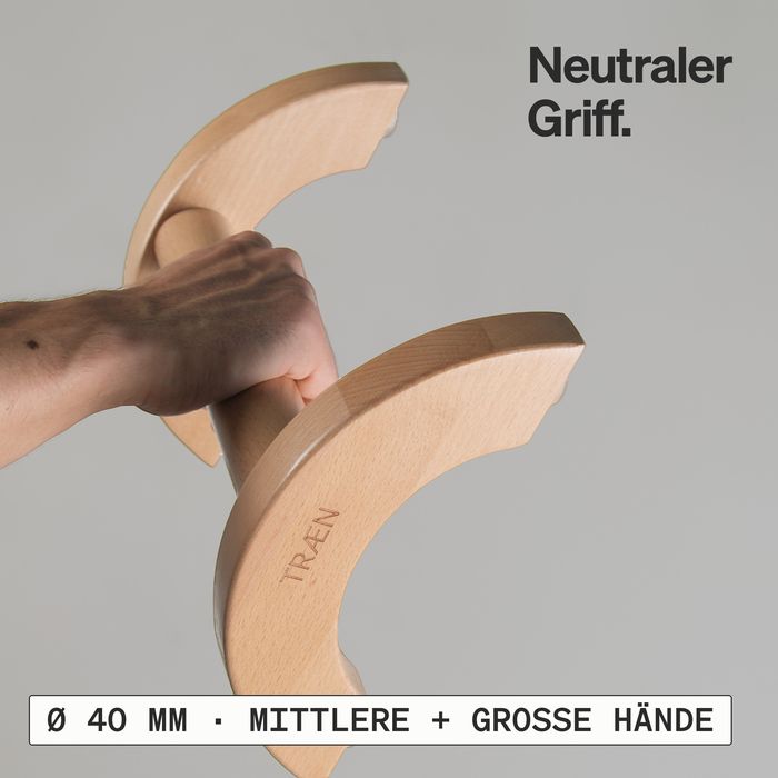 Eine Hand umfasst den Griff eines LG1-Breit-Paares